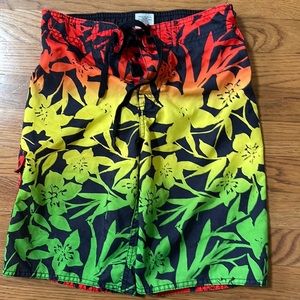 Swim trunks w/drawstring and Velcro to keep shorts in place Velcro side pocket